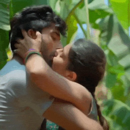 Passionate lip kiss gif