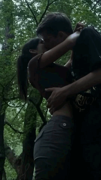 The adorable moment when two lovebirds lock lips. So sweet